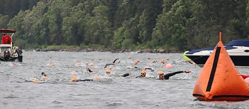 Sprint distance swimmers approach land during the Riding Mountain Triathlon in Wasagaming on Saturday morning. The swim was shortened from 750 metres to 300 because of concerns about the choppiness of the water. The Olympic distance swimmers, who went out 90 minutes earlier, were able to do the full 1,500 metres (Perry Bergson/The Brandon Sun)
Aug. 19, 2023