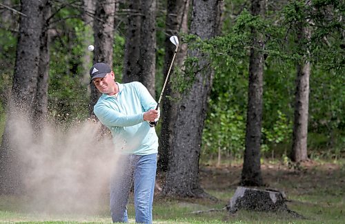 Jarod Crane hits a bunker shot on his penultimate hole of Tamarack golf tournament qualifying at Clear Lake Golf Course on Sunday. The defending champion shot 69-70 to claim medallist honours in the men's division. (Thomas Friesen/The Brandon Sun)