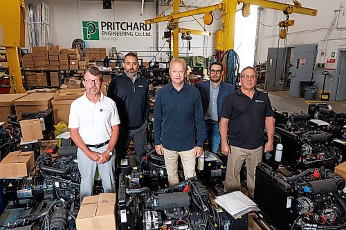 MIKE DEAL / WINNIPEG FREE PRESS
Mike Best (centre), Pritchard president, with partners (from left), Ron Bell, Mike Veloso, Jeff Hildebrand, and Gary Mack, in the Pritchard plant at 100 Otter Street, with a number of generators almost ready to be shipped to customers.
Pritchard is celebrating 100 years in business this year.
230821 - Monday, August 21, 2023.