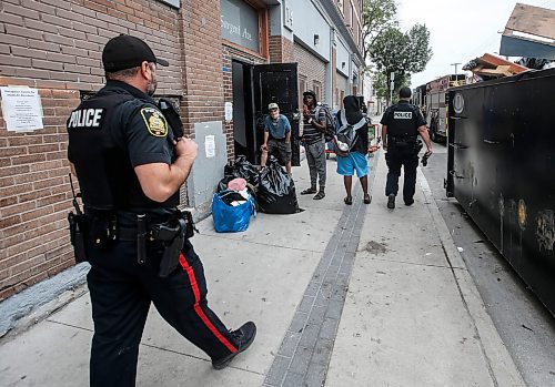 JOHN WOODS / WINNIPEG FREE PRESS
Police enter the building as people are evicted from 743 Sargent Ave. in Winnipeg, Monday, August  21, 2023. 

Reporter: ?