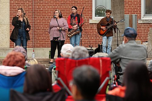 Members of REIMAGINED perform during Music In The Park at Princess Park in downtown Brandon on Tuesday evening. 
(Photos by Tim Smith/The Brandon Sun)