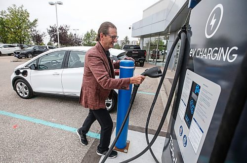 JOHN WOODS / WINNIPEG FREE PRESS
Stephen Chipman, President of the Birchwood Group, shows off their electric vehicle (EV) charger at their GM dealership on Pembina in Winnipeg Tuesday, August  22, 2023. Birchwood is installing chargers at many of their dealerships.

Reporter: Cash