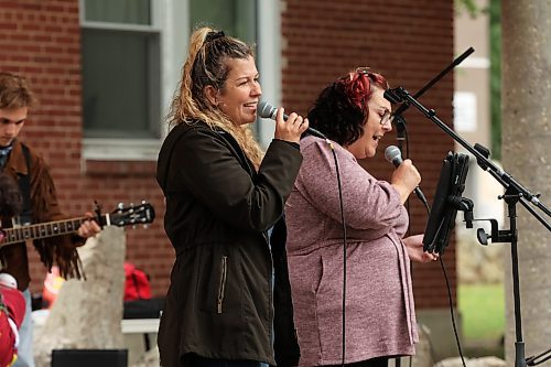 22082023
Members of REIMAGINED perform during Music In The Park at Princess Park in downtown Brandon on Tuesday evening. 
(Tim Smith/The Brandon Sun)