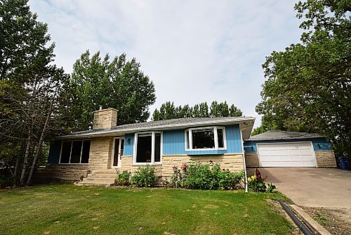 Photos by Todd Lewys / Winnipeg Free Press
Custom built in 1970, this bungalow sits on a magnificent 5.89 acre lot that's surrounded by mature trees, and runs to the Red River.