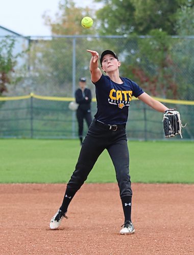Shortstop Kaitlyn Couckuyt of the under-15 Brandon Heat makes a throw to first base during a recent practice. The Heat is competing in Softball Manitoba&#x2019;s under-15 AA provincial championship starting today at Ashley Neufeld Softball Complex. (Perry Bergson/The Brandon Sun)