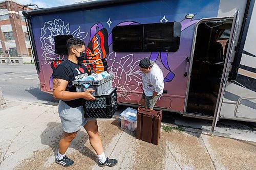 MIKE DEAL / WINNIPEG FREE PRESS
Ally Seidlitz (left) and Davey Col (right) at Sunshine House, 646 Logan Ave., loading up supplies for the Sunshine House RV or MOPS (Mobile Overdose Prevention Site) before heading out to their fixed location in the parking lot of 631 Main Street.
See Malak Abas and Katrina Clarke story
230816 - Wednesday, August 16, 2023.