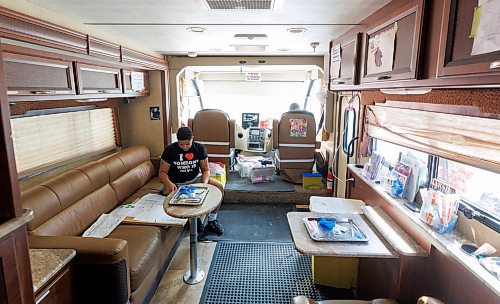 MIKE DEAL / WINNIPEG FREE PRESS
Ally Seidlitz does some paperwork inside the Sunshine House RV or MOPS (Mobile Overdose Prevention Site) at the location in the parking lot of 631 Main Street.
See Malak Abas and Katrina Clarke story
230816 - Wednesday, August 16, 2023.