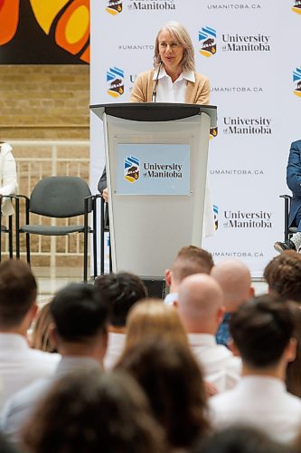 MIKE DEAL / WINNIPEG FREE PRESS
Lanette Siracusa, CEO, Shared Health, speaks to the assembled crowd during the Inaugural Day Exercises.
Family, friends and medical dignitaries gather in the Brodie Centre Atrium, Bannatyne Campus, 727 McDermot Avenue, for the University of Manitoba&#x2019;s Inaugural Day Exercises of the largest medical class in University of Manitoba history, the Class of 2027. The Max Rady College of Medicine will see 125 incoming medical students this coming year up from 110 students in recent years. During the event the new students take part in the White Coat Ceremony and recite the Physician&#x2019;s Pledge.
See Tessa Adamski story 
230823 - Wednesday, August 23, 2023.
