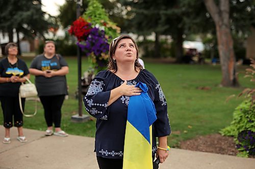 Julia Krykavska, co-founder of the Ukrainian-Canadian Association Tryzub, sings the Ukrainian national anthem during a flag raising and Ukrainian Independence Day celebrations at Brandon City Hall on Thursday, one and a half year’s into Russia’s invasion of the country. Brandon Mayor Jeff Fawcett spoke before raising the flag with members of Brandon’s Ukrainian community. (Photos by Tim Smith/The Brandon Sun)