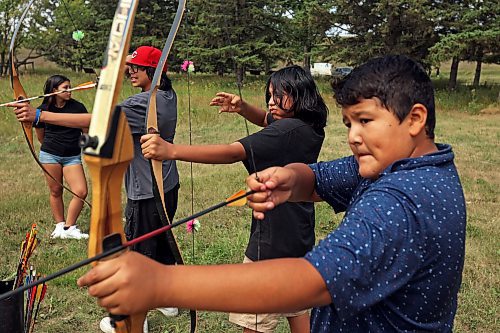 24082023
Kids practice their archery skills during Dakota Tiwahe Days at Sioux Valley Dakota Nation&#x2019;s Grand Valley Park outside Brandon on Thursday. The family days began Tuesday and wrap up today with an Amazing Race style scavenger hunt. Some of the other events included horse riding, laser tag and a dance party.
(Tim Smith/The Brandon Sun)