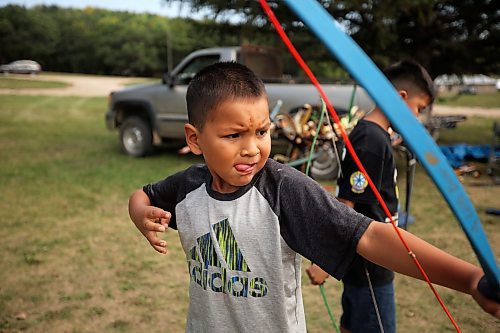 24082023
Seven-year-old Jordie Brown learns archery skills during Dakota Tiwahe Days at Sioux Valley Dakota Nation&#x2019;s Grand Valley Park outside Brandon on Thursday. The family days began Tuesday and wrap up today with an Amazing Race style scavenger hunt. Some of the other events included horse riding, laser tag and a dance party.
(Tim Smith/The Brandon Sun)