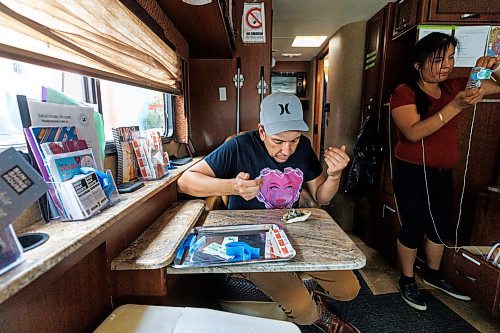 MIKE DEAL / WINNIPEG FREE PRESS
Vida Lamour a peer support and outreach worker gets a smudge ready as the Sunshine House RV or MOPS (Mobile Overdose Prevention Site) opens for business at the location in the parking lot of 631 Main Street.
See Malak Abas and Katrina Clarke story
230816 - Wednesday, August 16, 2023.