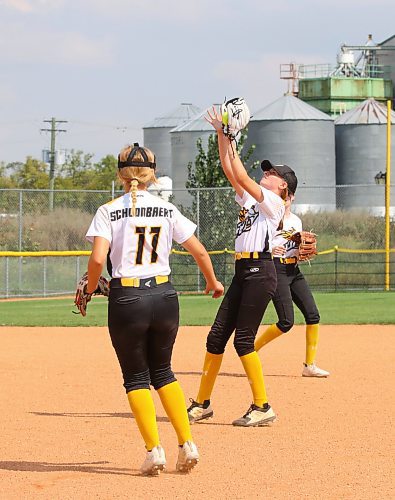 Second baseman Ella Clarke (12) of the Westman Fury gathers in a popup under the watchful eye of first baseman Jill Schoonbaert (11) during a game against the Manitoba Reapers at Ashley Neufeld Softball Complex on Friday during Softball Manitoba&#x2019;s under-13 AA provincial championship. (Perry Bergson/The Brandon Sun)
Aug. 25, 2023
