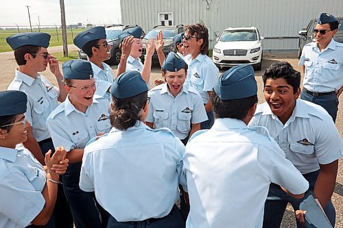 25082023
Course Cadets celebrate after receiving their Glider Pilot Training Course wings at the Brandon Cadet Training Centre graduation ceremony at the Commonwealth Air Training Plan Museum on Friday.
(Tim Smith/The Brandon Sun)