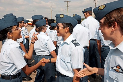 25082023
Course Cadets celebrate after receiving their Glider Pilot Training Course wings at the Brandon Cadet Training Centre graduation ceremony at the Commonwealth Air Training Plan Museum on Friday.
(Tim Smith/The Brandon Sun)