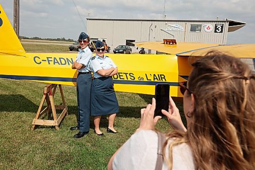 25082023
Course Cadet Declan Funnell of 699 Jasper Place Royal Canadian Air Cadet Squadron in Edmonton poses for photos in front of a glider with Captain Morgan Herda, Glider Instructor and  Deputy Flight Commander of Apollo Flight, after Funnell received his Glider Pilot Licence during the Brandon Cadet Training Centre graduation ceremony at the Commonwealth Air Training Plan Museum on Friday.
(Tim Smith/The Brandon Sun)