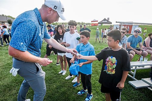 JOHN WOODS / WINNIPEG FREE PRESS
Hayden Springer, winner of the Manitoba Open, signs souvenirs for young fans at the Southwood Golf Course in Winnipeg Sunday, August 27, 2023.

Re: mcintyre