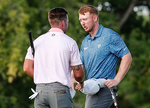 JOHN WOODS / WINNIPEG FREE PRESS
Hayden Springer, right, and Johnny Travale shake hands at the Manitoba Open at the Southwood Golf Course in Winnipeg Sunday, August 27, 2023.

Re: mcintyre