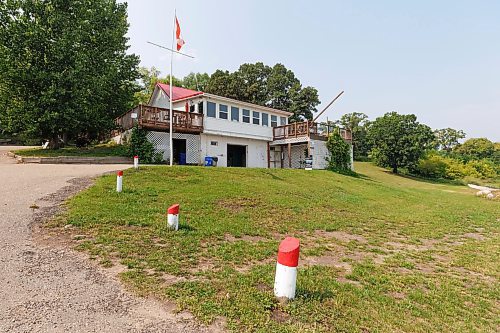 MIKE DEAL / WINNIPEG FREE PRESS
The Pelican Yacht Club on Pelican Lake in the town of Ninette, MB.
See Ben Waldman story
230815 - Tuesday, August 15, 2023.