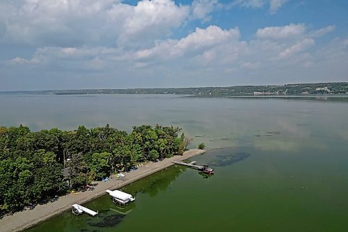 28082023
Clouds are reflected in Pelican Lake on a sunny Monday afternoon. 
(Tim Smith/The Brandon Sun)