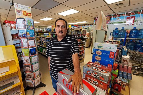 MIKE DEAL / WINNIPEG FREE PRESS
Ali Tarar owner of the store, the Grocery Box, is a former criminal lawyer who has lived in Ninette for 10 years after a short stay in Toronto and a previous career in Gujrat, Pakistan.
See Ben Waldman story
230815 - Tuesday, August 15, 2023.