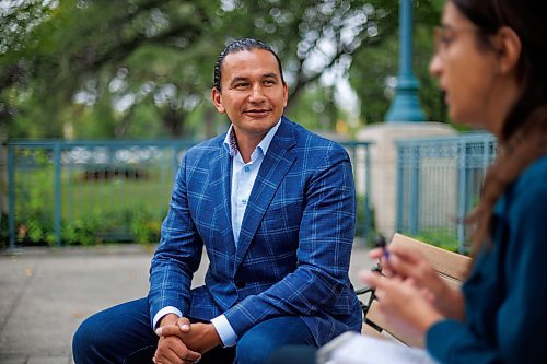 MIKE DEAL / WINNIPEG FREE PRESS
Leader of the Manitoba NDP, Wab Kinew, sits down with reporter Danielle DaSilva for an interview on the south grounds of the Manitoba Legislative building Tuesday morning.
230829 - Tuesday, August 29, 2023.