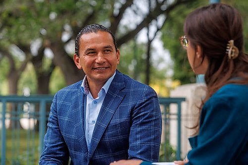 MIKE DEAL / WINNIPEG FREE PRESS
Leader of the Manitoba NDP, Wab Kinew, sits down with reporter Danielle DaSilva for an interview on the south grounds of the Manitoba Legislative building Tuesday morning.
230829 - Tuesday, August 29, 2023.