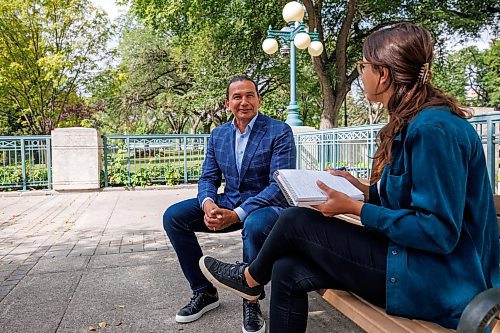 MIKE DEAL / WINNIPEG FREE PRESS
Leader of the Manitoba NDP, Wab Kinew, sits down with reporter Danielle DaSilva for an interview on the south grounds of the Manitoba Legislative building Tuesday morning.
230829 - Tuesday, August 29, 2023.