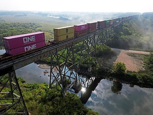 29082023
A train passes over the Rivers trestle on a smoky Tuesday morning.
(Tim Smith/The Brandon Sun)