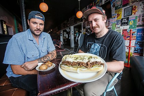 JOHN WOODS / WINNIPEG FREE PRESS
Mischa Decter, right, and Kadin Gray have opened Primo&#x2019;s Deli in the Goodwill Social Club on Portage Avenue in Winnipeg Tuesday, August 29, 2023. Their big sellers are the Randy Newman sandwich and the Knish.

Re: wasney