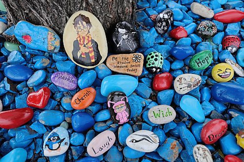 RUTH BONNEVILLE / WINNIPEG FREE PRESS

INTERSECTION (Ruth)

Photo of Nancy-Tina Coutu with her rock garden at 1402 Leila Ave.  

This is for an Intersection piece on Winnipeg Kindness Rock Gardens, a Facebook group devoted to home rock gardens/libraries that act in the same manner as those little libraries, full of books. Basically, people set up rock gardens in their yard - some in a garden, others in treasure chests or shelving units - and others are welcome to drop by, to collect a rock, while leaving one behind, sort of idea. 

A &quot;thing&quot; across North America Nancy-Tina (first on list) started the group in the summer of 2020. Maggie (second) was one of the first to join in, and there are now close to 150 little rock libraries thru-out the city. 

Pics of the ones listed, each is charming in its own right; along with pics of the keepers of the gardens/rock libraries 

This is for the Sat Sept 2 Intersection page ... everybody's expecting a call. 

See story by Dave.

August 29th, 2023

