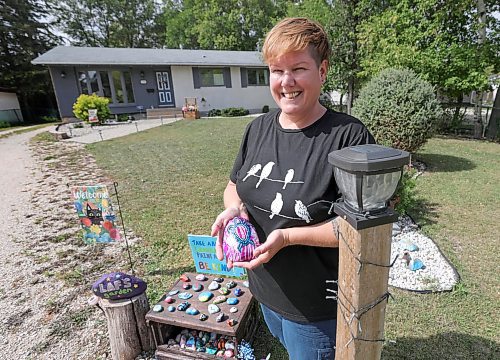 RUTH BONNEVILLE / WINNIPEG FREE PRESS

INTERSECTION (Ruth)

Photo of Lisa Laferty, with her rock garden at 720 Fairmont Rd (Charleswood, 

This is for an Intersection piece on Winnipeg Kindness Rock Gardens, a Facebook group devoted to home rock gardens/libraries that act in the same manner as those little libraries, full of books. Basically, people set up rock gardens in their yard - some in a garden, others in treasure chests or shelving units - and others are welcome to drop by, to collect a rock, while leaving one behind, sort of idea. 

A &quot;thing&quot; across North America Nancy-Tina (first on list) started the group in the summer of 2020. Maggie (second) was one of the first to join in, and there are now close to 150 little rock libraries thru-out the city. 

Pics of the ones listed, each is charming in its own right; along with pics of the keepers of the gardens/rock libraries 

This is for the Sat Sept 2 Intersection page ... everybody's expecting a call. 

See story by Dave.

August 29th, 2023

