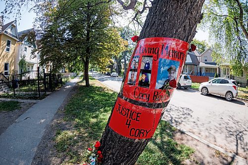 MIKE DEAL / WINNIPEG FREE PRESS
A memorial, for Cory Roger Roullete, 38, is taped to the tree outside the building where he was killed, 583 Furby Street.  
See Tyler Searle story
230830 - Wednesday, August 30, 2023.