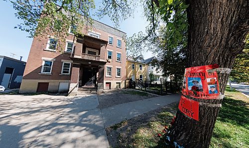 MIKE DEAL / WINNIPEG FREE PRESS
A memorial, for Cory Roger Roullete, 38, is taped to the tree outside the building where he was killed, 583 Furby Street.  
See Tyler Searle story
230830 - Wednesday, August 30, 2023.