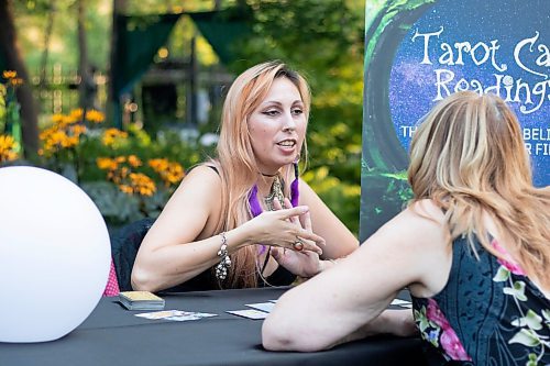 Mike Thiessen / Winnipeg Free Press 
Tarot card reading was one of the activities at the 2023 Garden Party at Assiniboine Park, a fundraiser for the park held in the Leo Mol Statue Garden. 230830 &#x2013; Wednesday, August 30, 2023