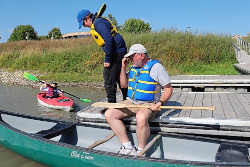 Jonathan Ferguson sets sail on a Assiniboine River canoe/kayak expedition alongside his boys Michael, William and Joseph (not pictured) on a sweltering Friday afternoon in Brandon. The Fergusons are looking to make the most of the Labour Day long weekend since the return of school is right around the corner. (Kyle Darbyson/The Brandon Sun)