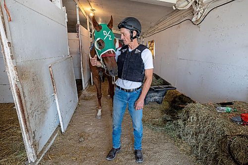 MIKE DEAL / WINNIPEG FREE PRESS
Jockey Tim Tarasenco with Stone Cafe, owned by Dale Zawislak, Friday morning at the Assiniboia Downs.
See George Williams story
230901 - Friday, September 01, 2023.