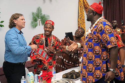 Members of Umu Igbo Brandon Association Inc. present Brandon Mayor Jeff Fawcett with some traditional Igbo attire during Saturday’s Igbo Cultural Day and New Yam Festival at the Ukrainian Reading Association Hall. (Kyle Darbyson/The Brandon Sun)