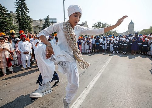 JOHN WOODS / WINNIPEG FREE PRESS
Members of the Manitoba Sikh community celebrate at the Nagar Kirtan parade, an annual celebration of the Guru Granth Sahib, the holy scripture of Sikhism in downtown Winnipeg Sunday, September 3, 2023. 

Re: Abas