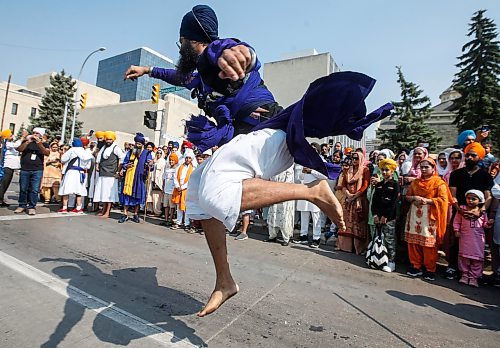 JOHN WOODS / WINNIPEG FREE PRESS
Members of the Manitoba Sikh community celebrate at the Nagar Kirtan parade, an annual celebration of the Guru Granth Sahib, the holy scripture of Sikhism in downtown Winnipeg Sunday, September 3, 2023. 

Re: Abas