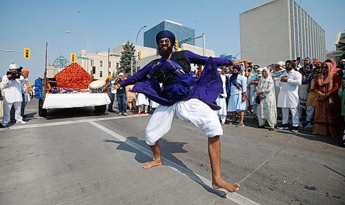 JOHN WOODS / WINNIPEG FREE PRESS
Members of the Manitoba Sikh community celebrate at the Nagar Kirtan parade, an annual celebration of the Guru Granth Sahib, the holy scripture of Sikhism in downtown Winnipeg Sunday, September 3, 2023. 

Re: Abas