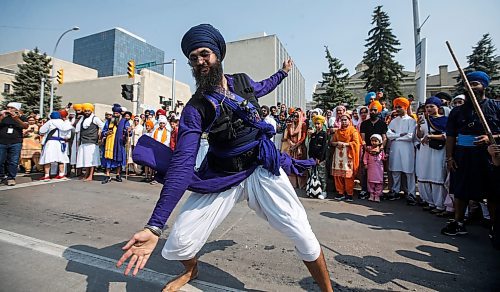 JOHN WOODS / WINNIPEG FREE PRESS
Members of the Manitoba Sikh community celebrate at the Nagar Kirtan parade, an annual celebration of the Guru Granth Sahib, the holy scripture of Sikhism in downtown Winnipeg Sunday, September 3, 2023. 

Re: Abas