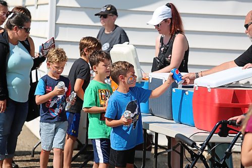 Local families drop by UFCW Local 832 headquarters in Brandon to partake in some barbecue and refreshments during Labour Day. (Kyle Darbyson/The Brandon Sun)