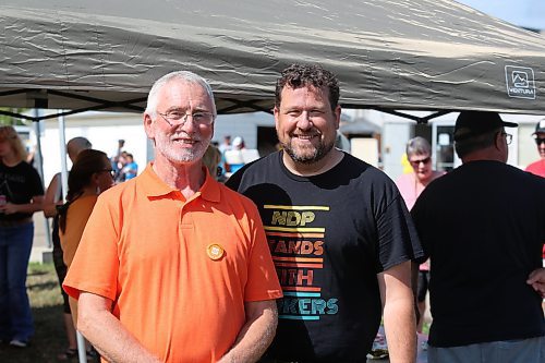 Local Manitoba NDP candidates Quentin Robinson (Brandon West) and Glen Simard (Brandon East) attend a Labour Day barbecue in Brandon to meet with members of the public and show their solidarity with local workers. (Kyle Darbyson/The Brandon Sun)