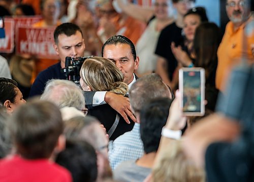 JOHN WOODS / WINNIPEG FREE PRESS
Wab Kinew, Manitoba NDP leader, kisses a woman before he speaks to supporters during a campaign launch rally at the University of Manitoba in Winnipeg Monday, September 4, 2023. 

Re: Abas