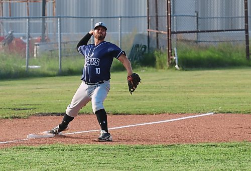 Minnedosa Mavericks veteran John Hutton, shown tagging the bag at third base and making a throw to first, was a key piece of the Mavericks historic championship run who returned to the club (Perry Bergson/The Brandon Sun)