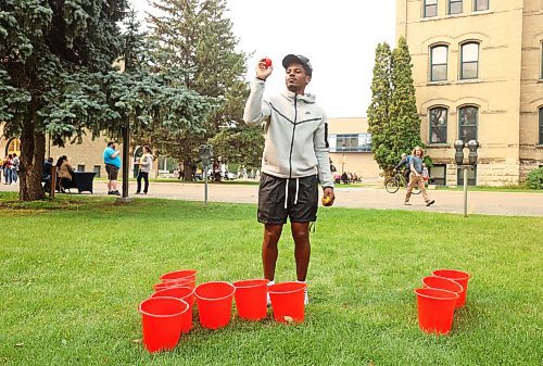 05092023
Brandon University student Khari Ojeda-Harvey plays a large and alcohol-free version of beer pong during a free BBQ lunch put on by BU for Orientation Day on Tuesday. The day for new and returning BU students included a variety of games, challenges, activities and information sessions.
(Tim Smith/The Brandon Sun)