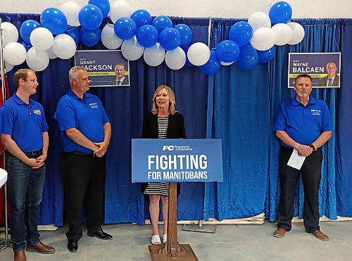 05092023
Progressive Conservative provincial Campaign Co-Chair Candice Bergen speaks during the grand opening of the PC campaign office at 382 Park Avenue East for local candidates Grant Jackson of Spruce Woods (L), Wayne Balcaen of Brandon West (second from L) and Len Isleifson of Brandon East (R) on Tuesday evening.
(Tim Smith/The Brandon Sun)