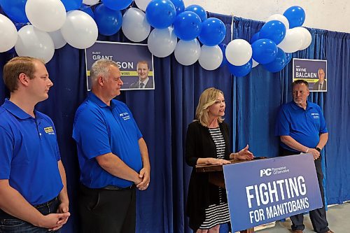 05092023
Progressive Conservative provincial Campaign Co-Chair Candice Bergen speaks during the grand opening of the PC campaign office at 382 Park Avenue East for local candidates Grant Jackson of Spruce Woods (L), Wayne Balcaen of Brandon West (second from L) and Len Isleifson of Brandon East (R) on Tuesday evening.
(Tim Smith/The Brandon Sun)
