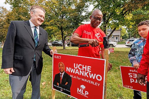 MIKE DEAL / WINNIPEG FREE PRESS
Manitoba Liberal Party Leader, Dougald Lamont, holds a sign for Uche Nwankwo, the party&#x2019;s candidate for Waverley, during the 2023 Campaign Launch in Parc Comm&#xe9;moratif Elz&#xe9;ar Goulet in St. Boniface, Wednesday morning.
See Danielle DaSilva story
230906 - Wednesday, September 06, 2023.